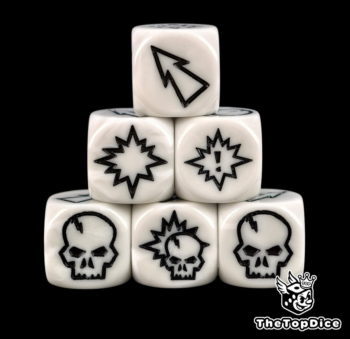 Close up of three white 16mm block dice with black symbols for resolving blocks