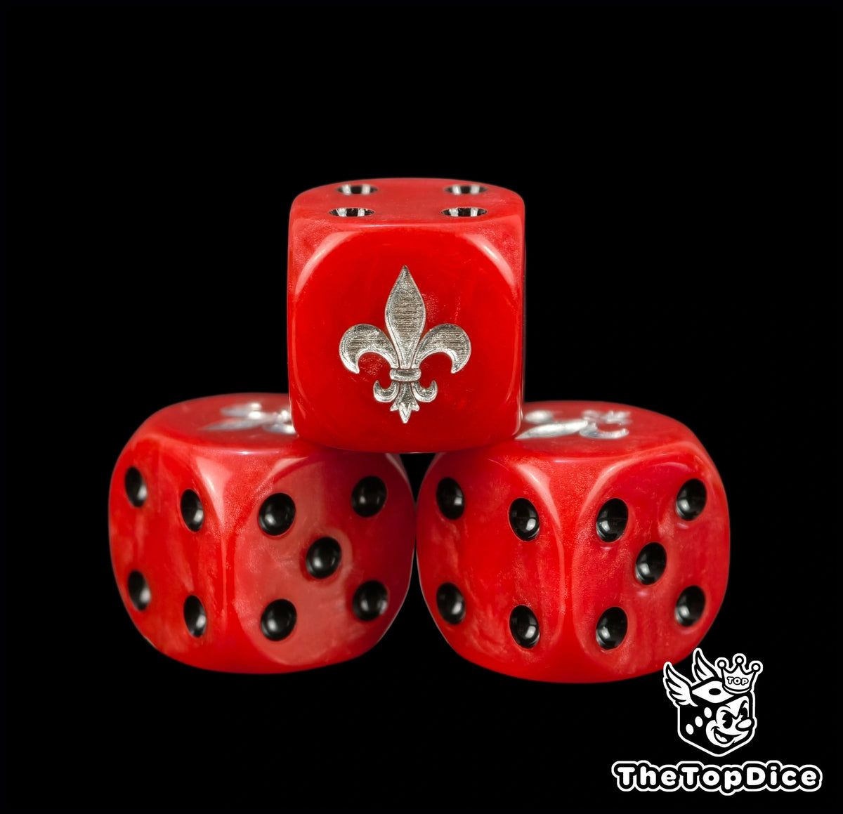 Close up of the silver fleur de lis engraved and hand filled on a red Adepta Sororitas 16mm D6 die