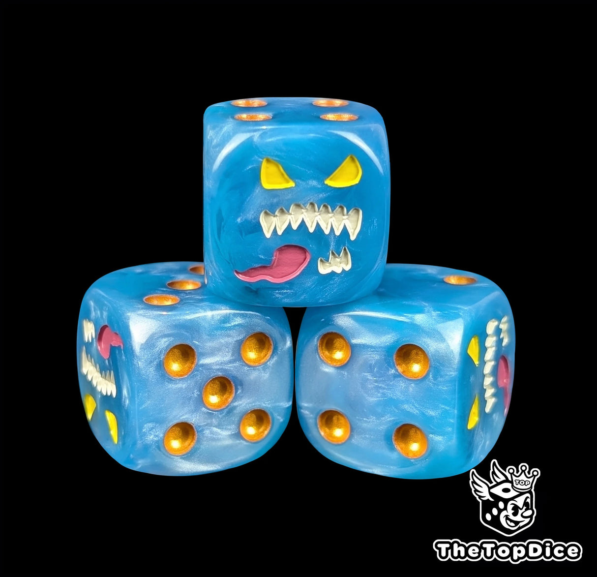 Close up of a blue 16mm resin D6 die engraved with a blue daemon face, yellow eyes and gold pips