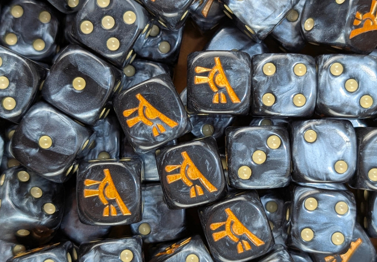 Pile of black and grey gold eye 16mm D6 dice for a sci-fi space elf army