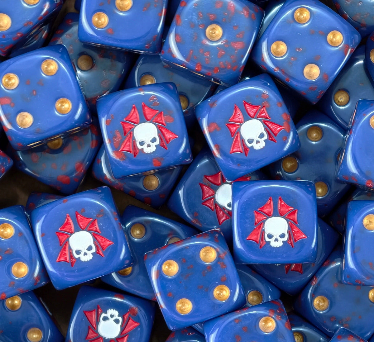 A pile of blood flecked Night Lords D6 with amber pips and skulls