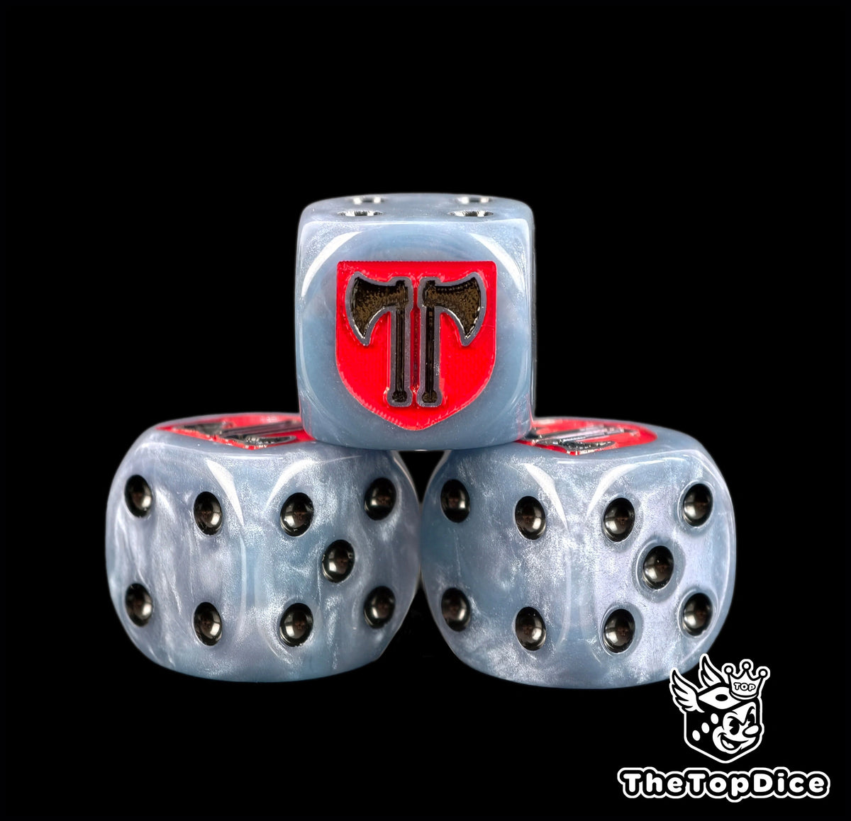 Three steel blue Executioners dice with black pips and the axe shield
