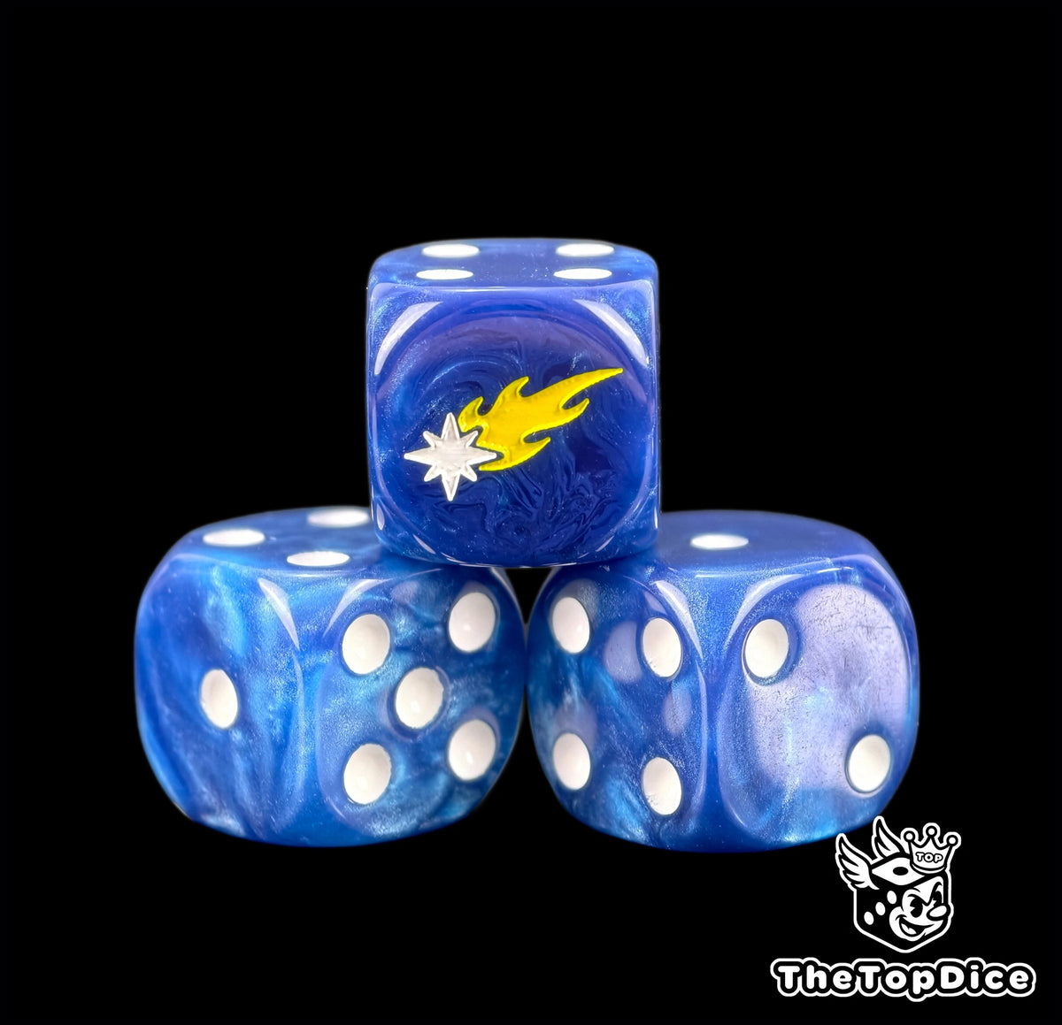 Three blue Marines Errant dice with white pips and a white comet