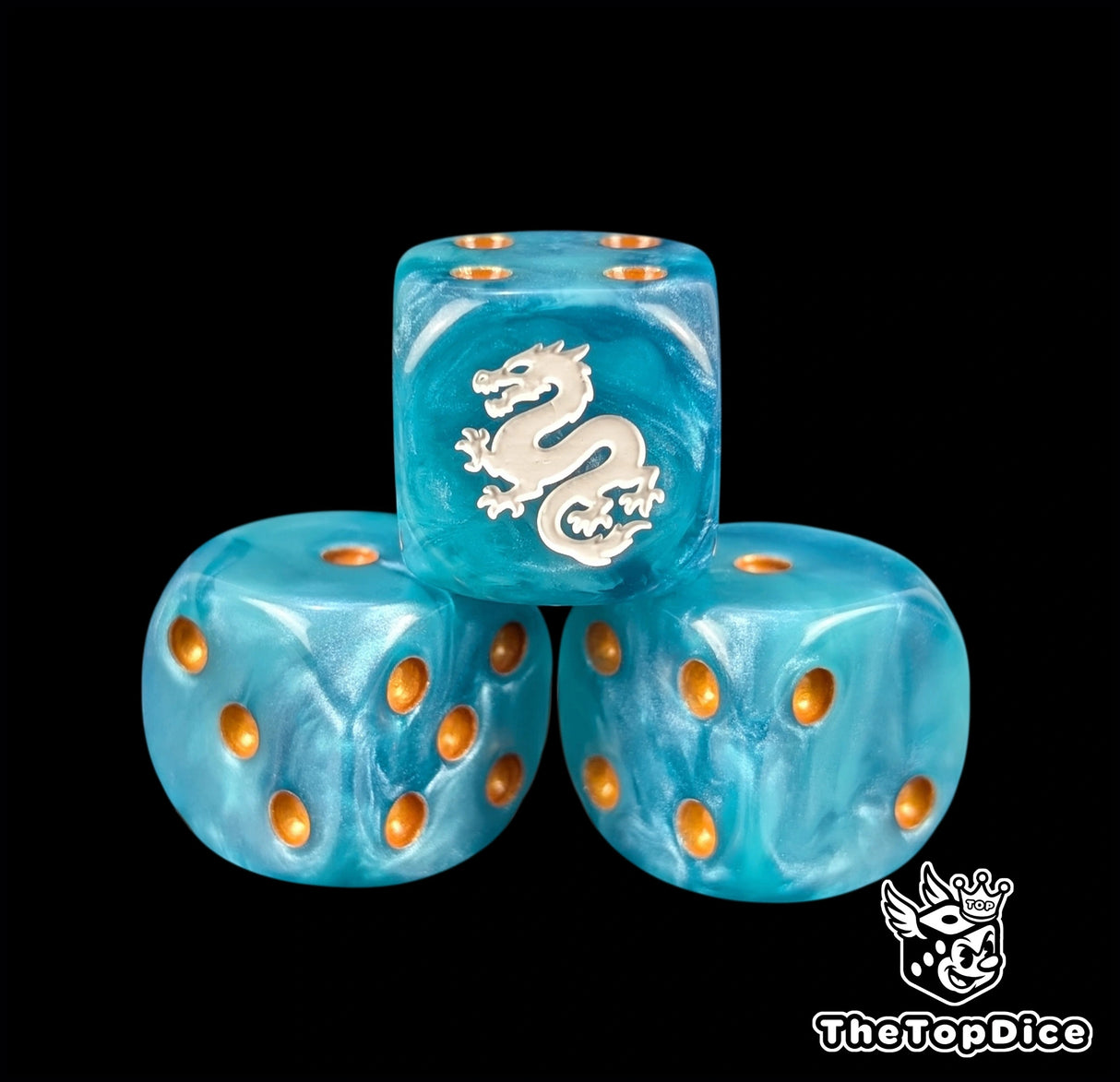 Close up of a blue 16mm resin D6 die engraved with a white eastern dragon and gold pips