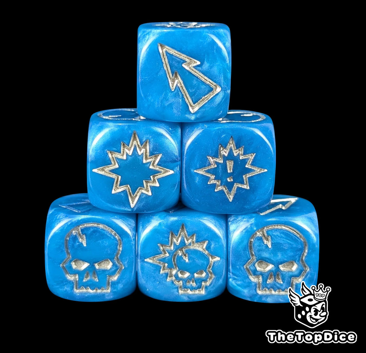 Close up of three blue 16mm block dice with silver symbols for resolving blocks in fantasy football