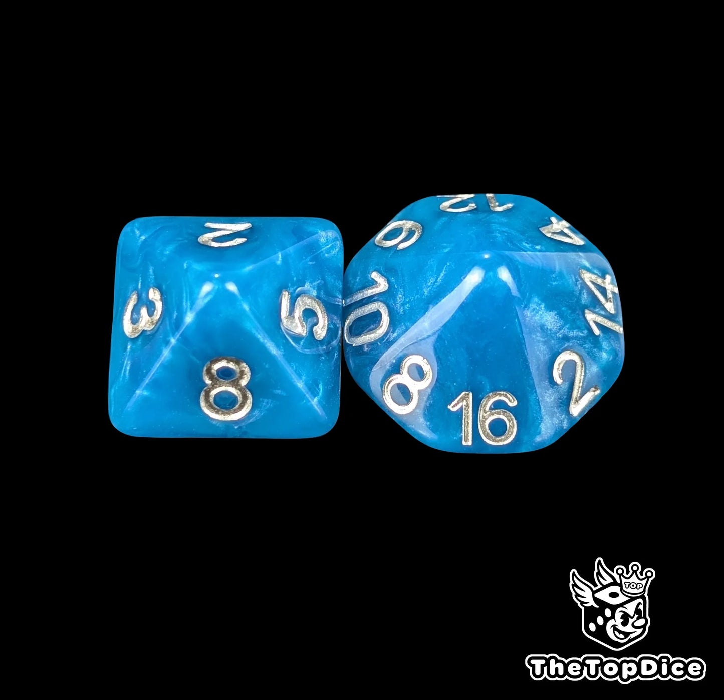 Close up of a blue D8 and D16 with silver numbers for scatter and long range fantasy football rolls
