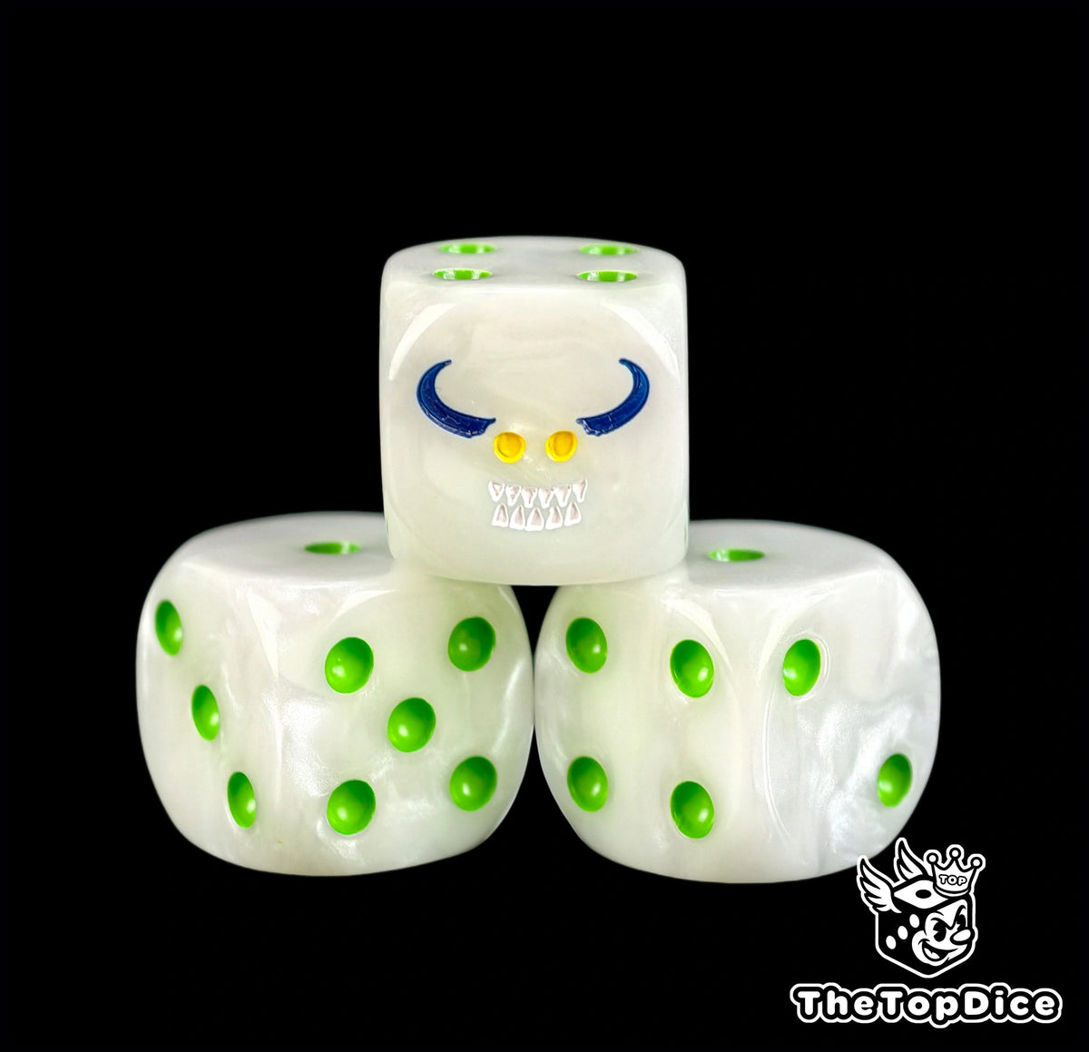 Three rotten white Nurgle dice with a grinning imp and green pips