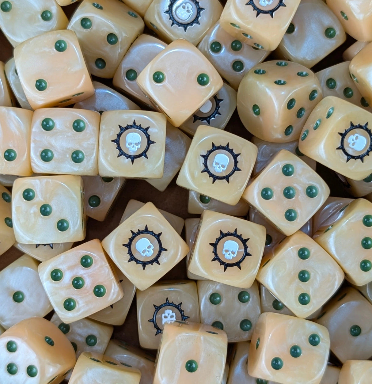 Pile of beige plague skull 16mm D6 dice for a sci-fi plague legion army
