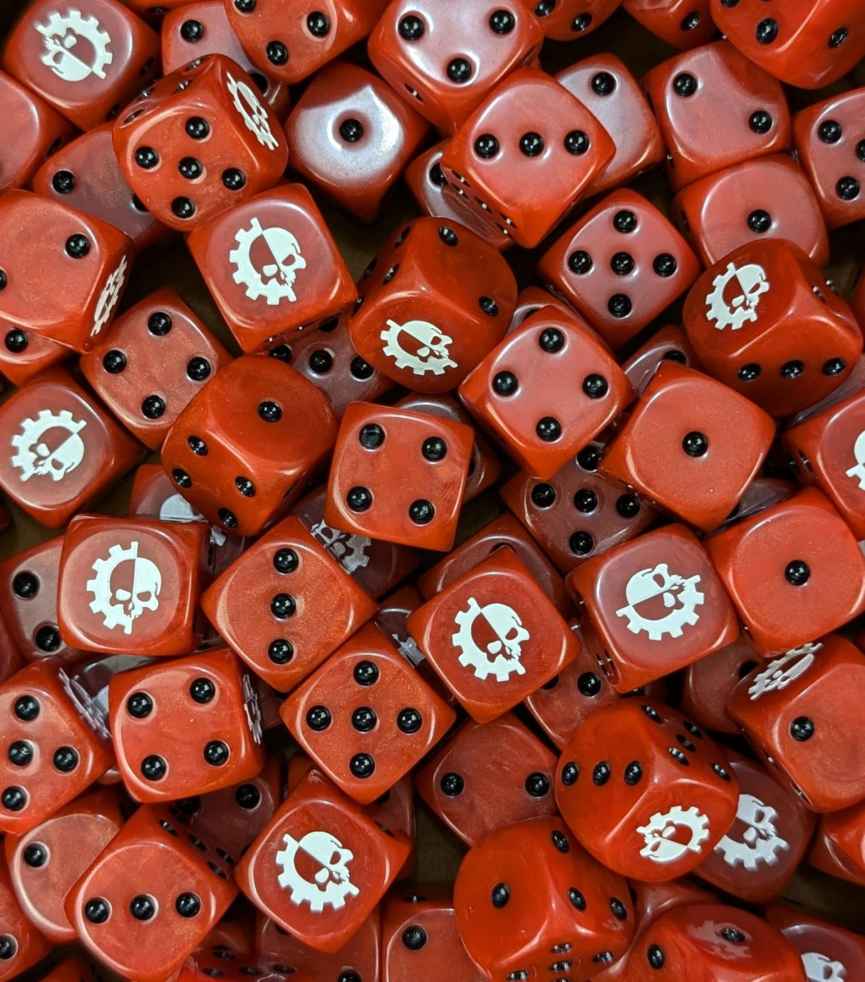 Pile of red cog skull 16mm D6 dice for a sci-fi machine cult army