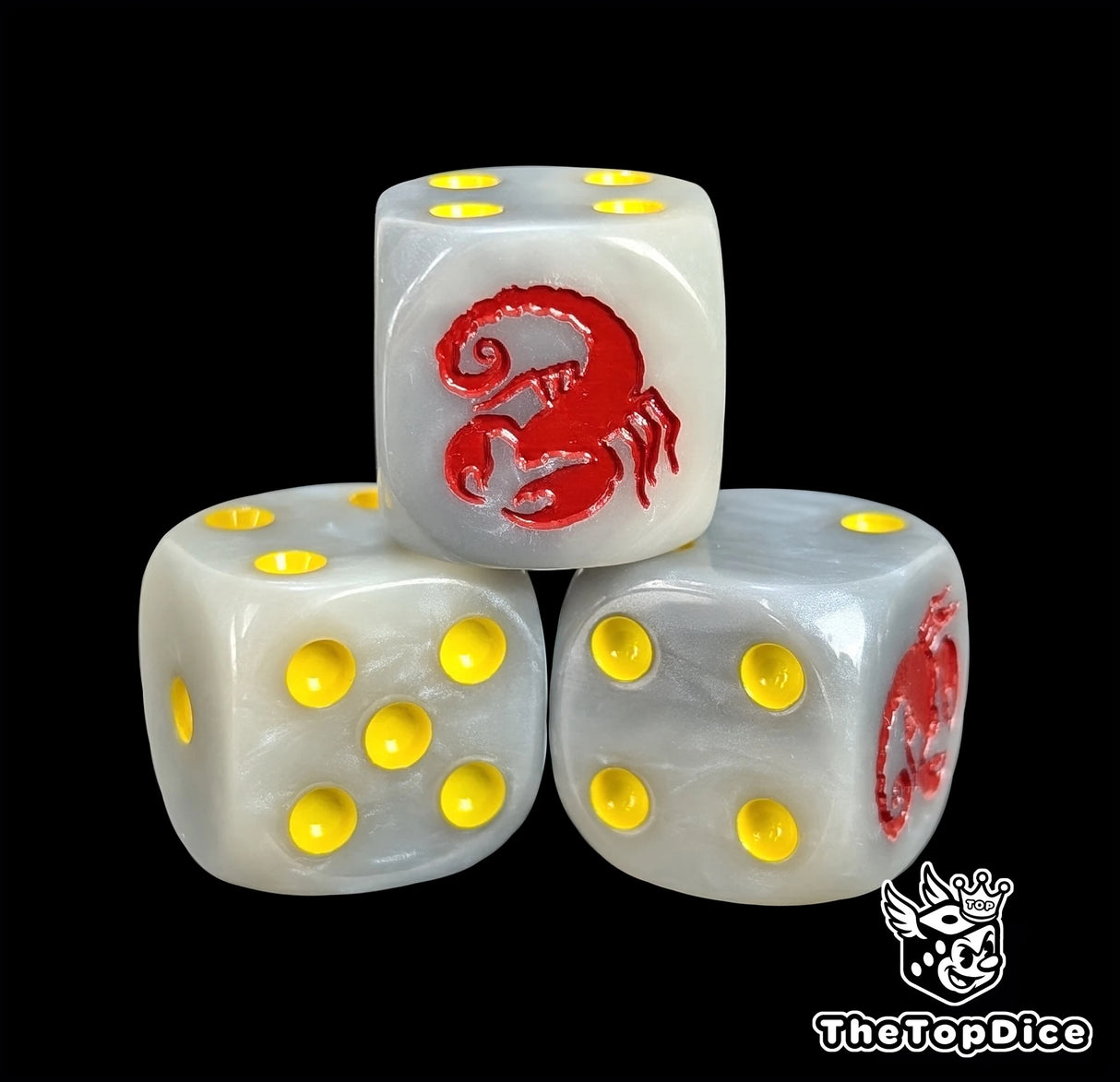 Close-up of a pale grey D6 die with a red scorpion emblem