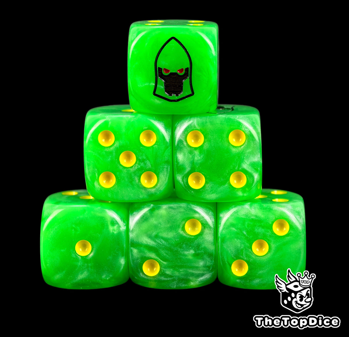 Six emerald Striking Scorpions D6 stacked with amber yellow pips