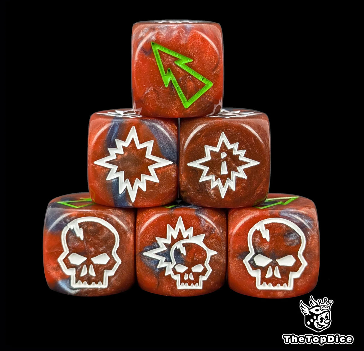 Close up of three red and blue 16mm block dice with green pips for resolving blocks