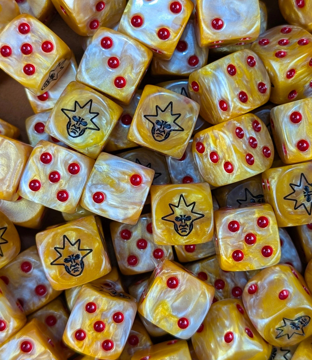 Pile of gold winged angel guard 16mm D6 dice for a sci-fi army