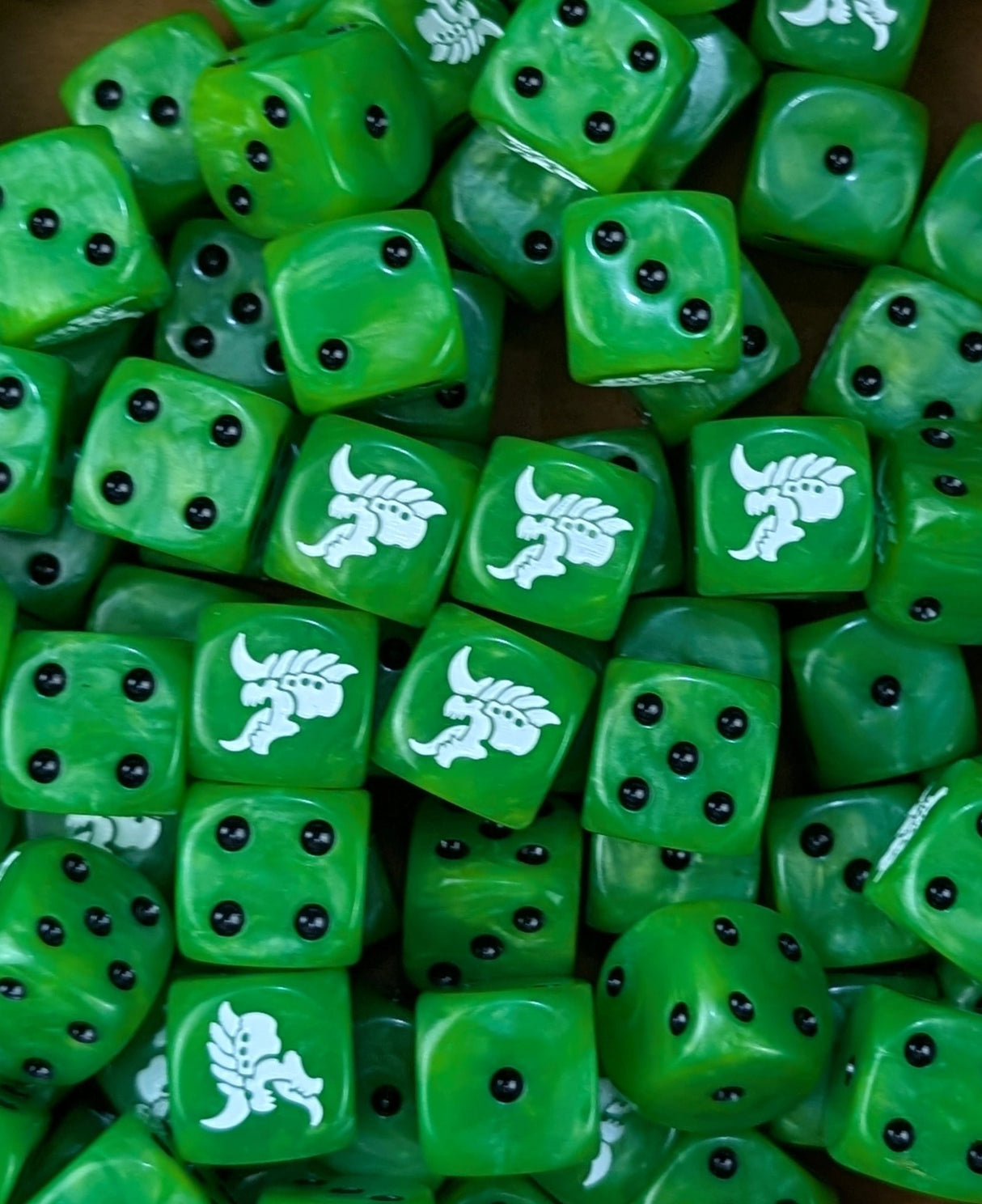 Pile of green hive alien 16mm D6 dice for a sci-fi xeno swarm
