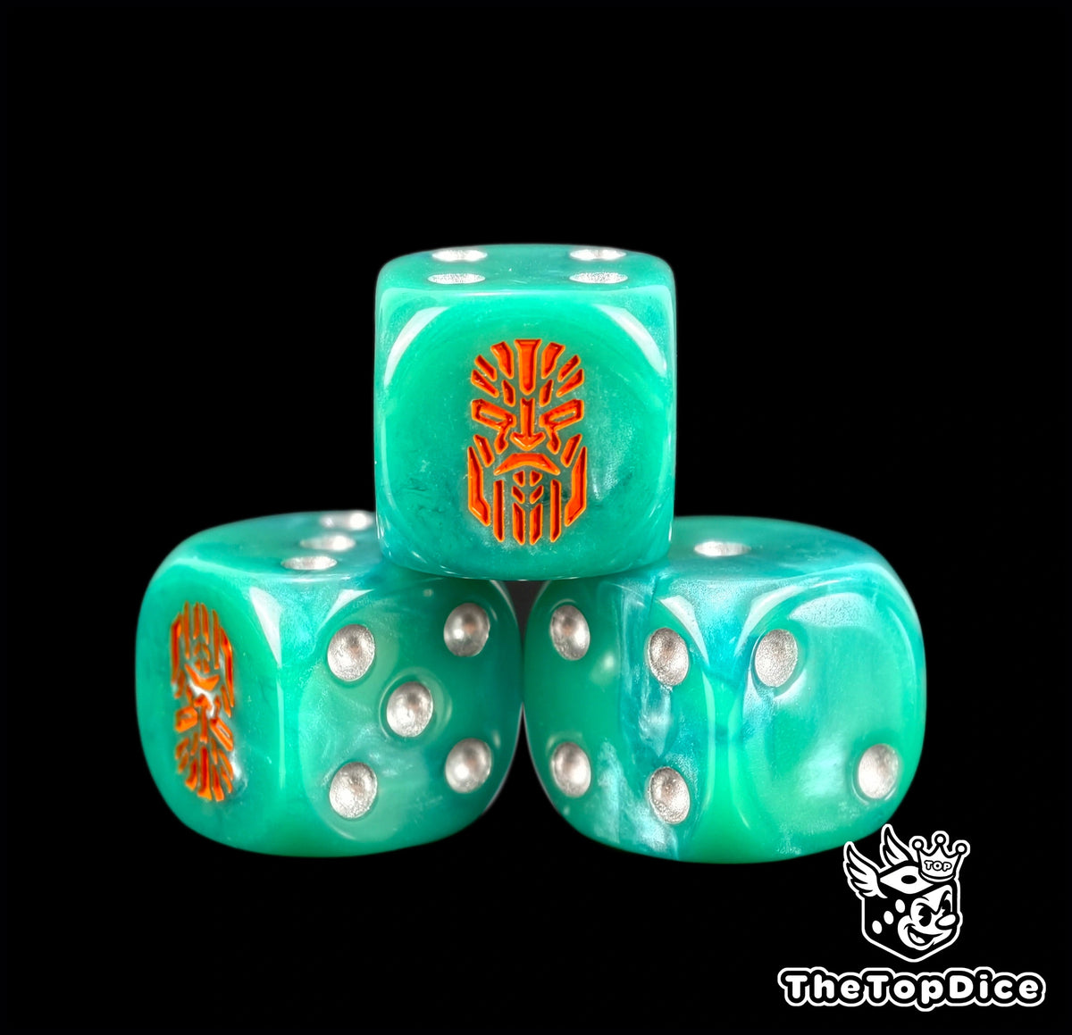 Three jade green Votann dice with pearl pips and an orange rune