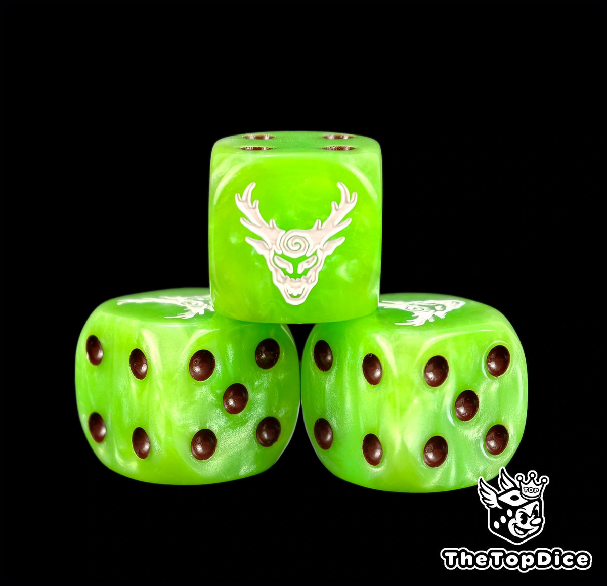 Three lime green wood elf dice with a white antlered tree face