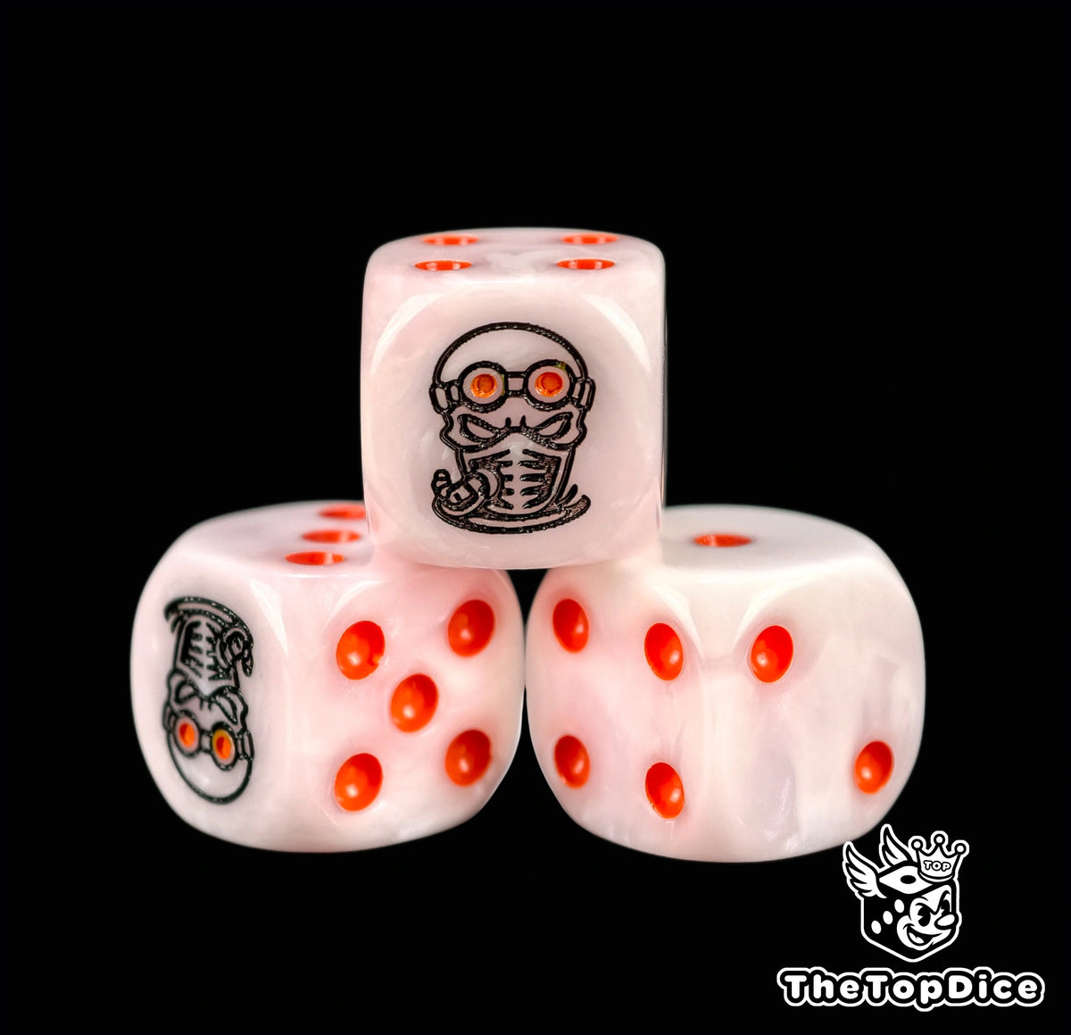 Three pink hybrid dice with orange pips and orange goggle lenses