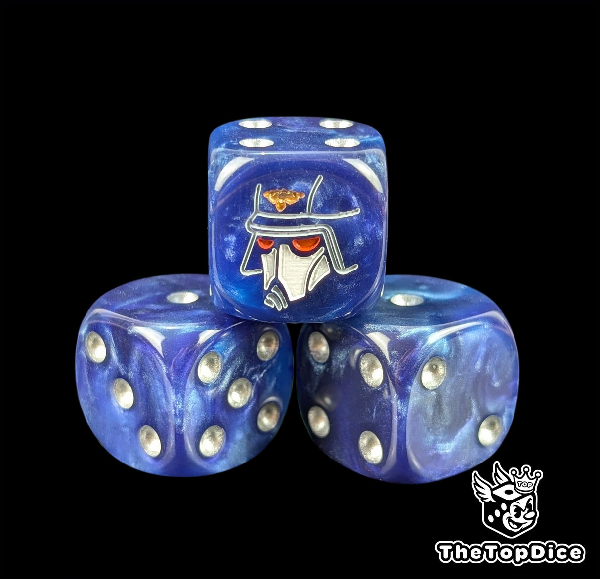 Close up of a dark navy 16mm resin D6 die engraved with a white gas mask helm and silver pips