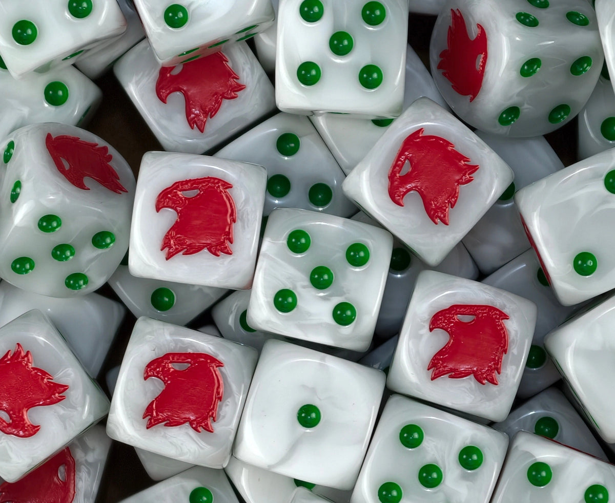 A pile of pearl white Mentors D6 with green pips and red eagles