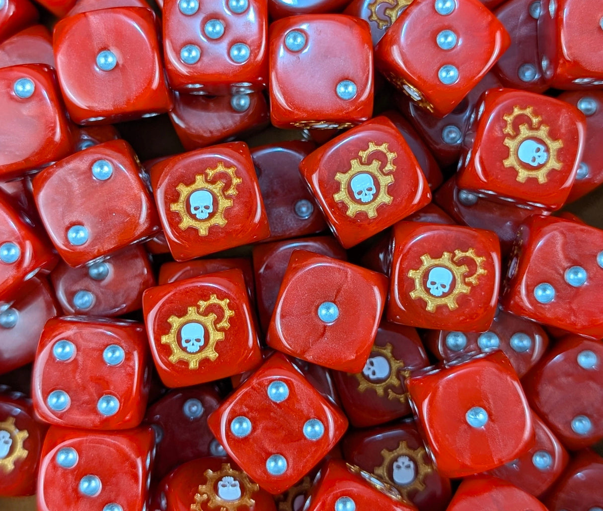 Pile of red cog skull 16mm D6 dice for a sci-fi tech priest army