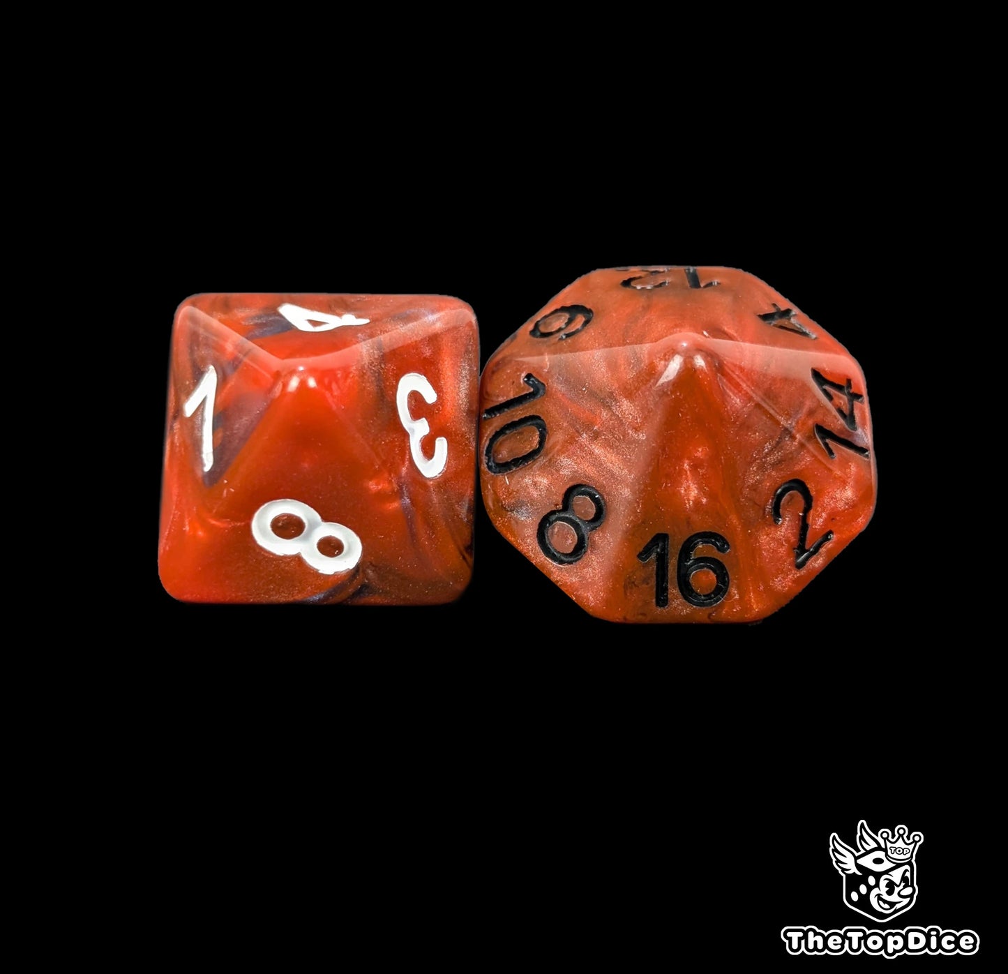 Close up of a red and blue D8 and D16 with white numbers for scatter and long range rolls