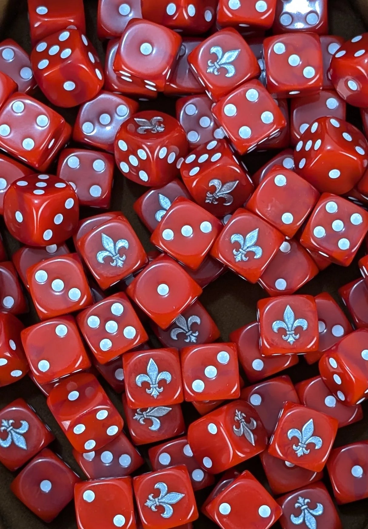 Pile of red fleur 16mm D6 dice for a sci-fi crusader army