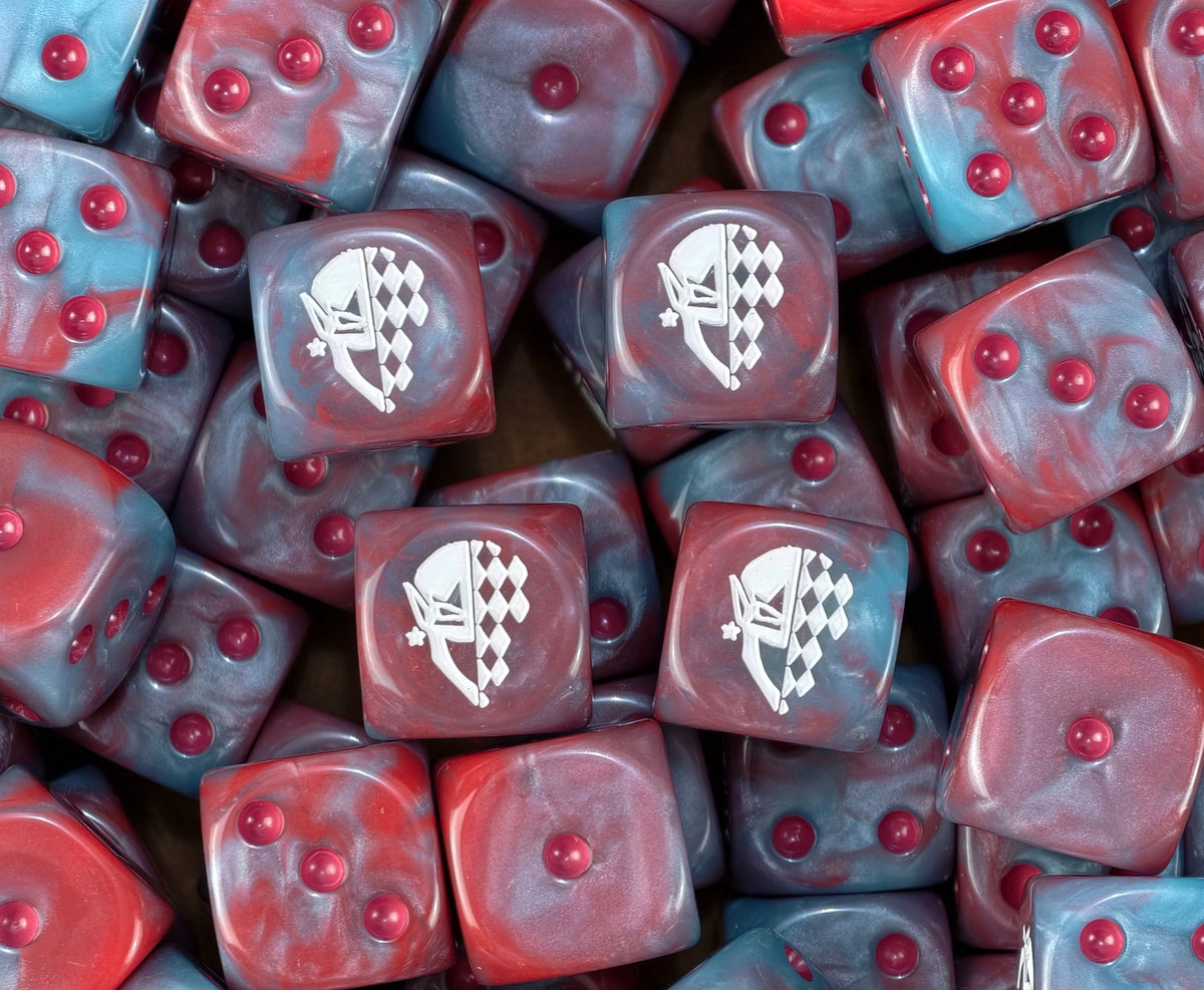 A pile of two tone red and blue harlequin dice, white masks repeating