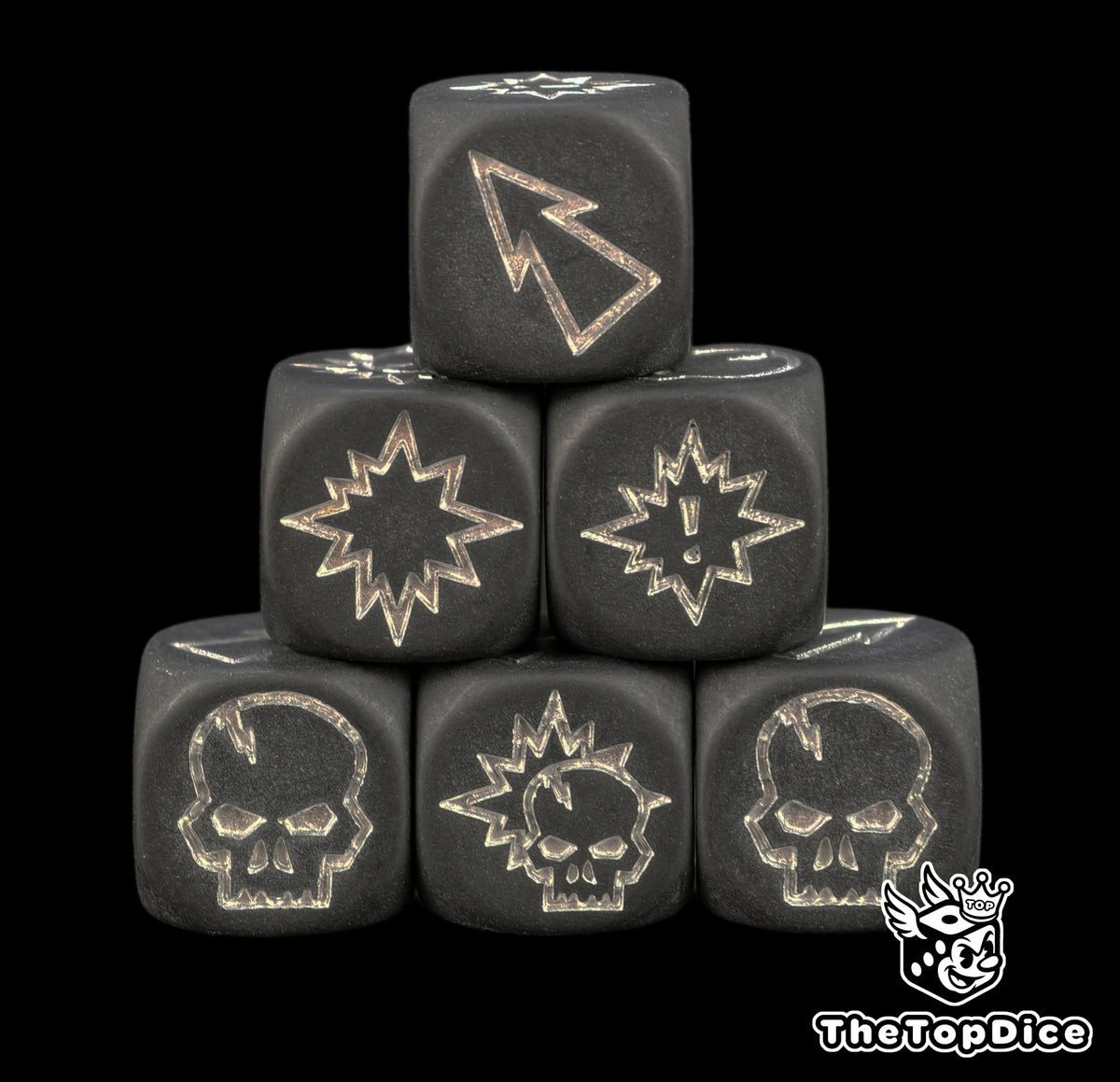 Six matte black Blood Bowl block dice stacked in a pyramid with silver skull, pow and push symbols