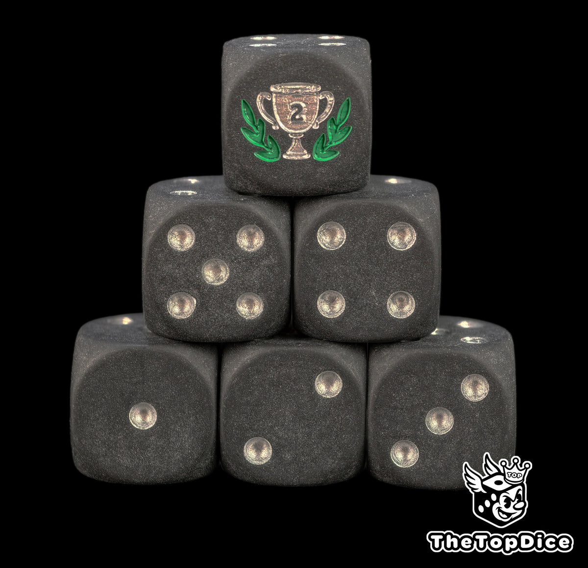 Six matte black D6 stacked in a pyramid, silver number two cup in a medium green laurel on top and silver pips