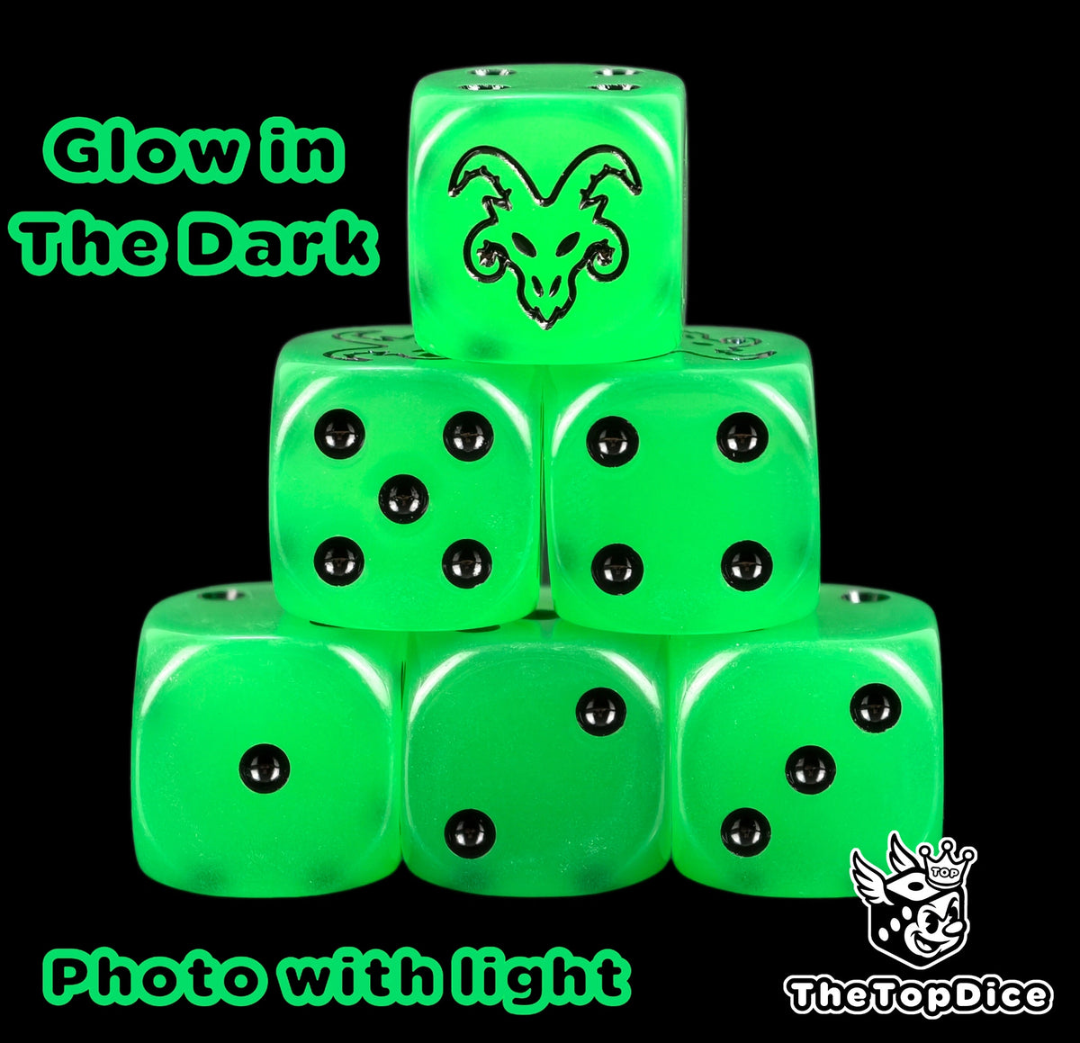 Skaven Age of Sigmar dice, translucent green glow in the dark 16mm resin D6 with black pips and a horned rat face, photographed with the lights on