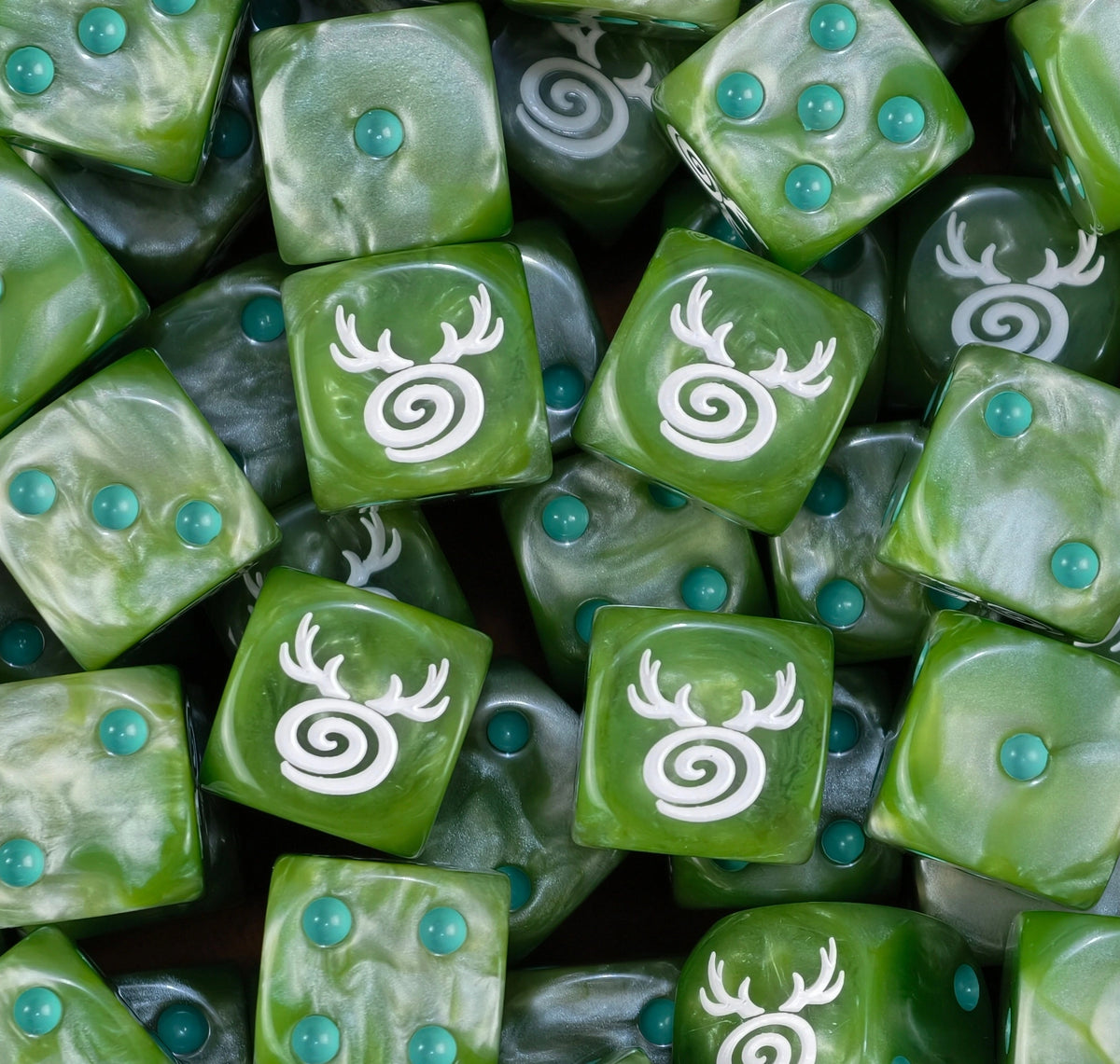 A pile of green Sylvaneth D6 with teal pips and white antler spirals