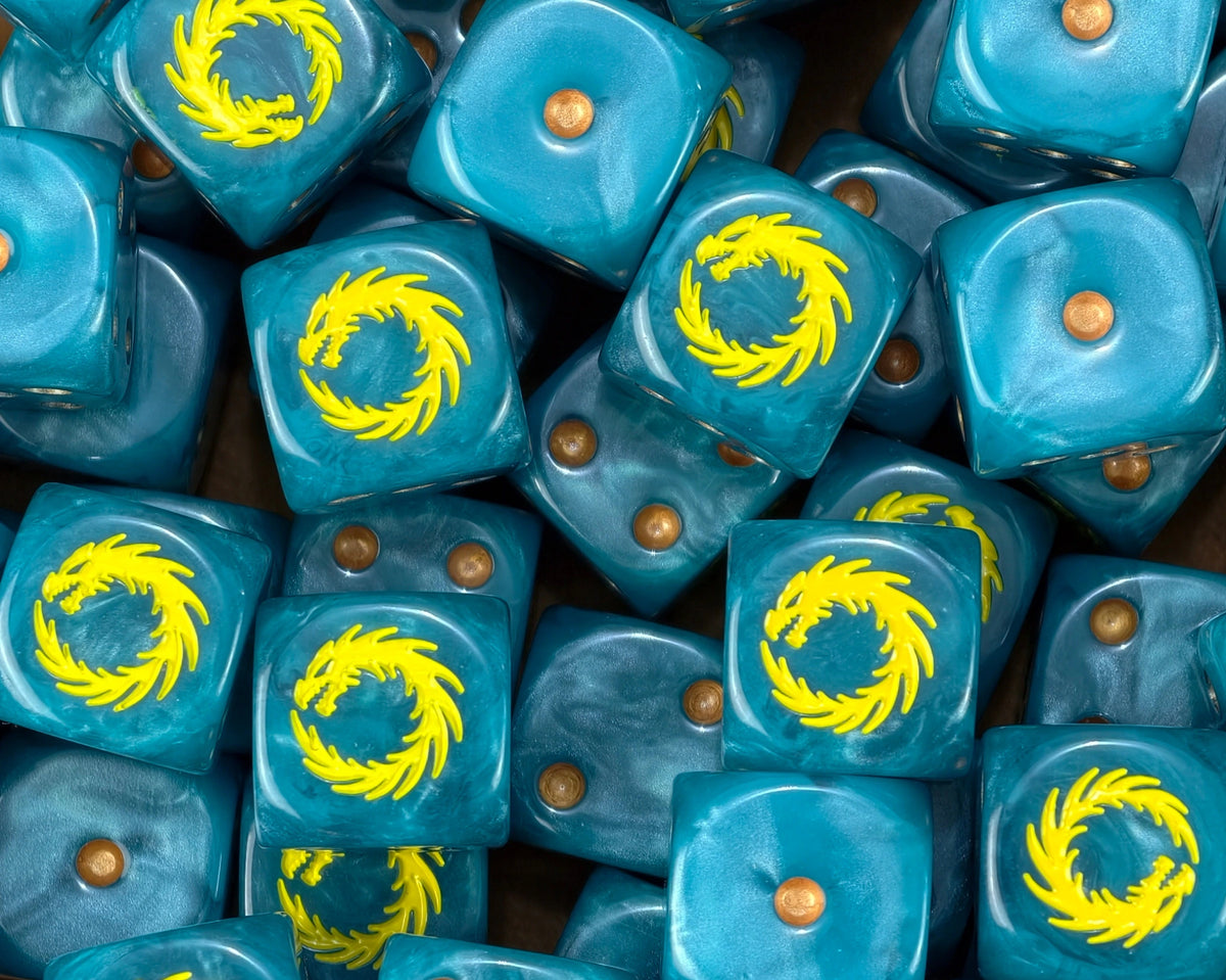 A pile of teal Thousand Sons dice, yellow dragons and gold pips repeating