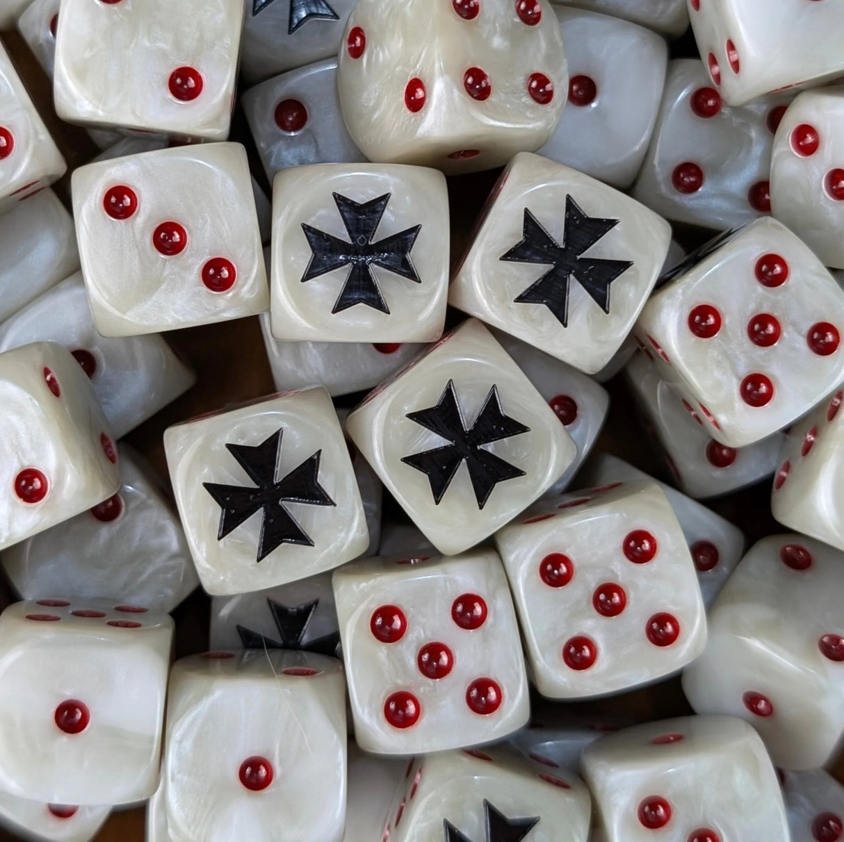 Pile of white and grey cross 16mm D6 dice for a sci-fi crusader army