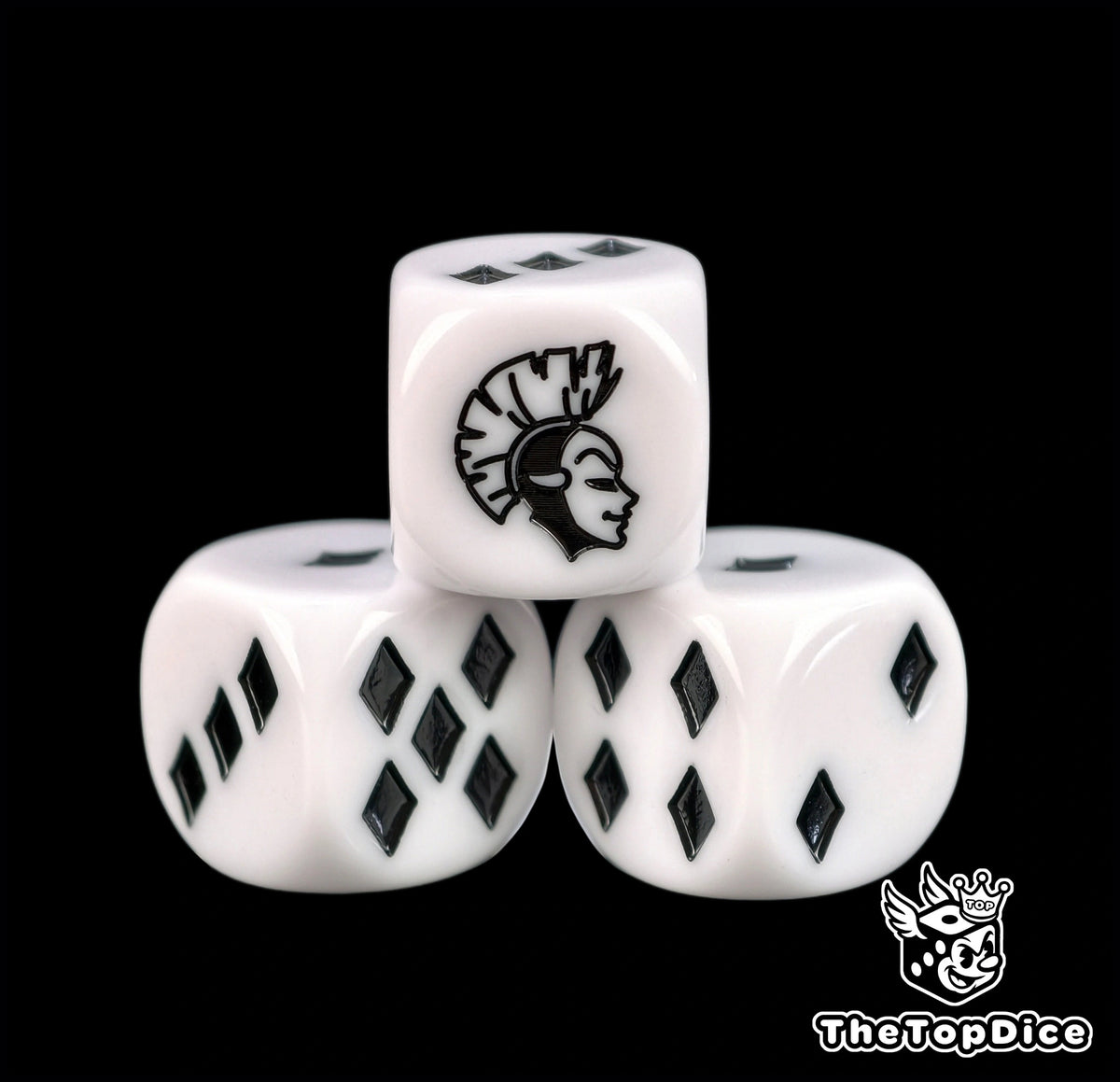 Three white Aeldari Harlequin dice with black diamond shaped pips