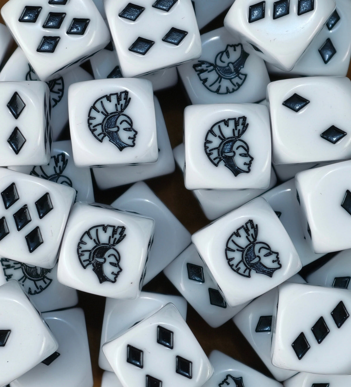 A pile of white Harlequin D6 with black diamond shaped pips