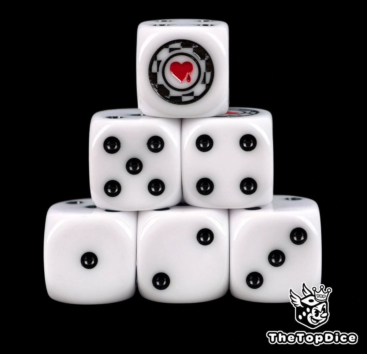 Six white Lamenters D6 stacked, black pips and a red heart poker chip