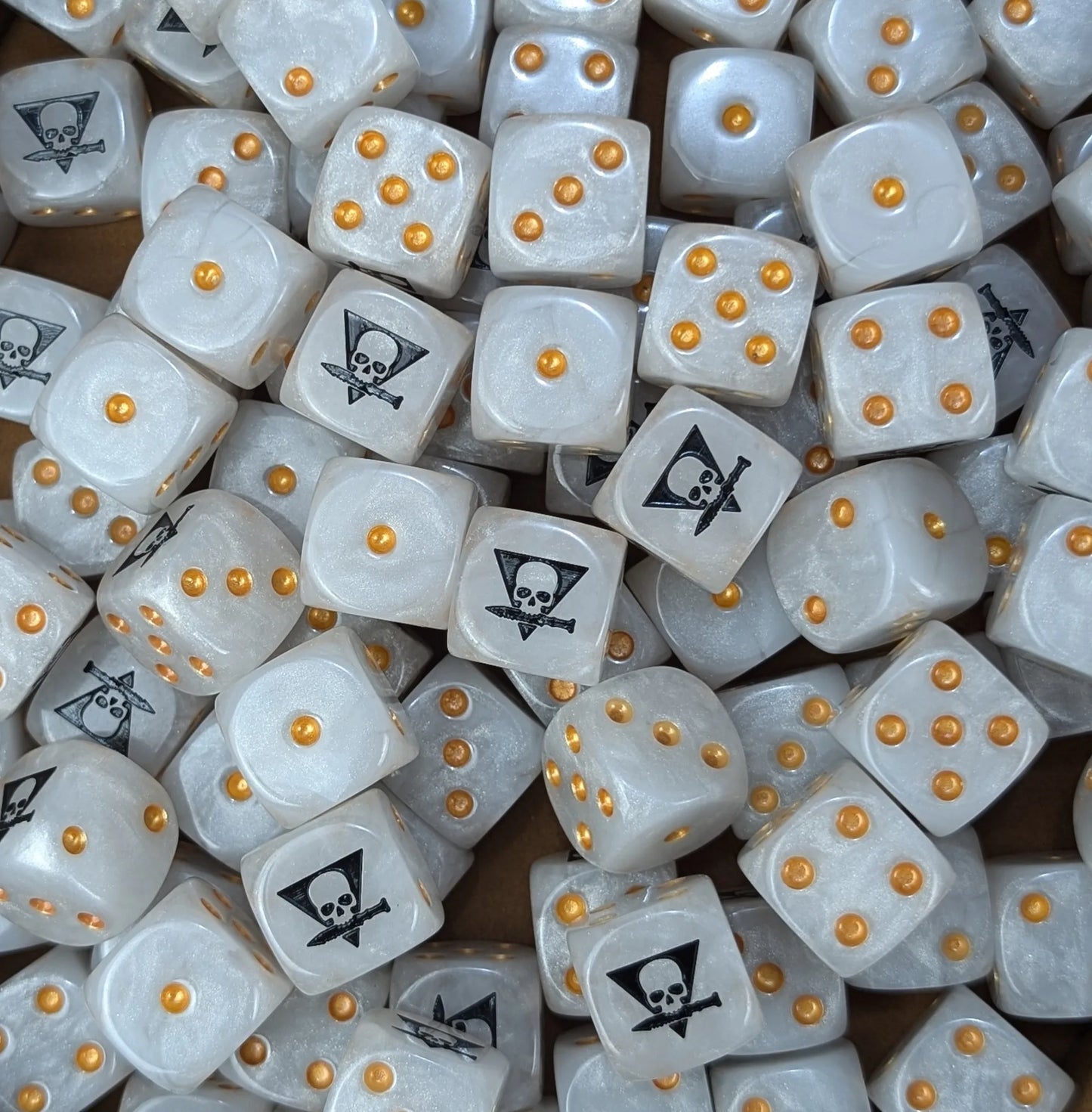 Pile of white skull squad 16mm D6 dice for a sci-fi skirmish team