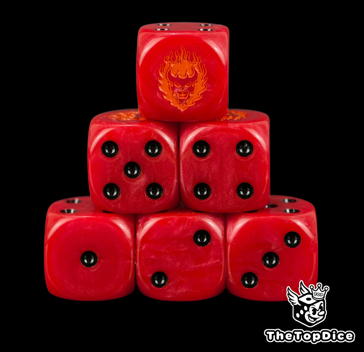 Word Bearers chaos space marine dice, crimson red 16mm resin D6 with black pips and an orange fire daemon face, stacked in a pyramid