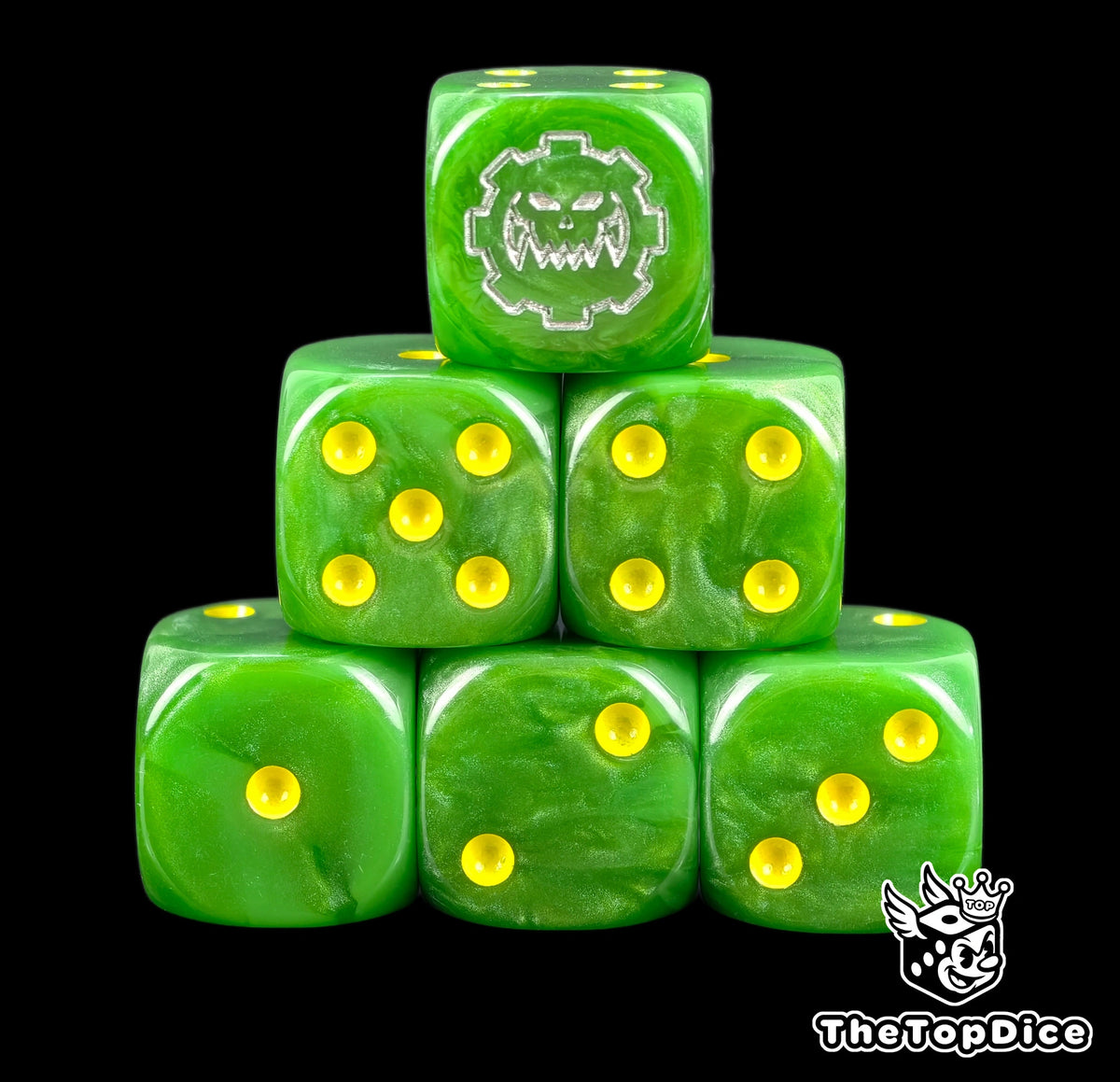 Six green Ork D6 stacked, yellow pips and a silver Mekboy cog skull