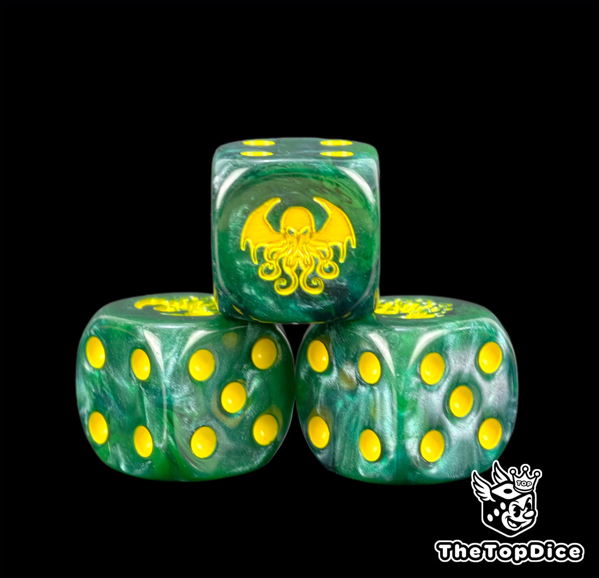 Three green Cthulhu dice with yellow pips and a tentacled Old One