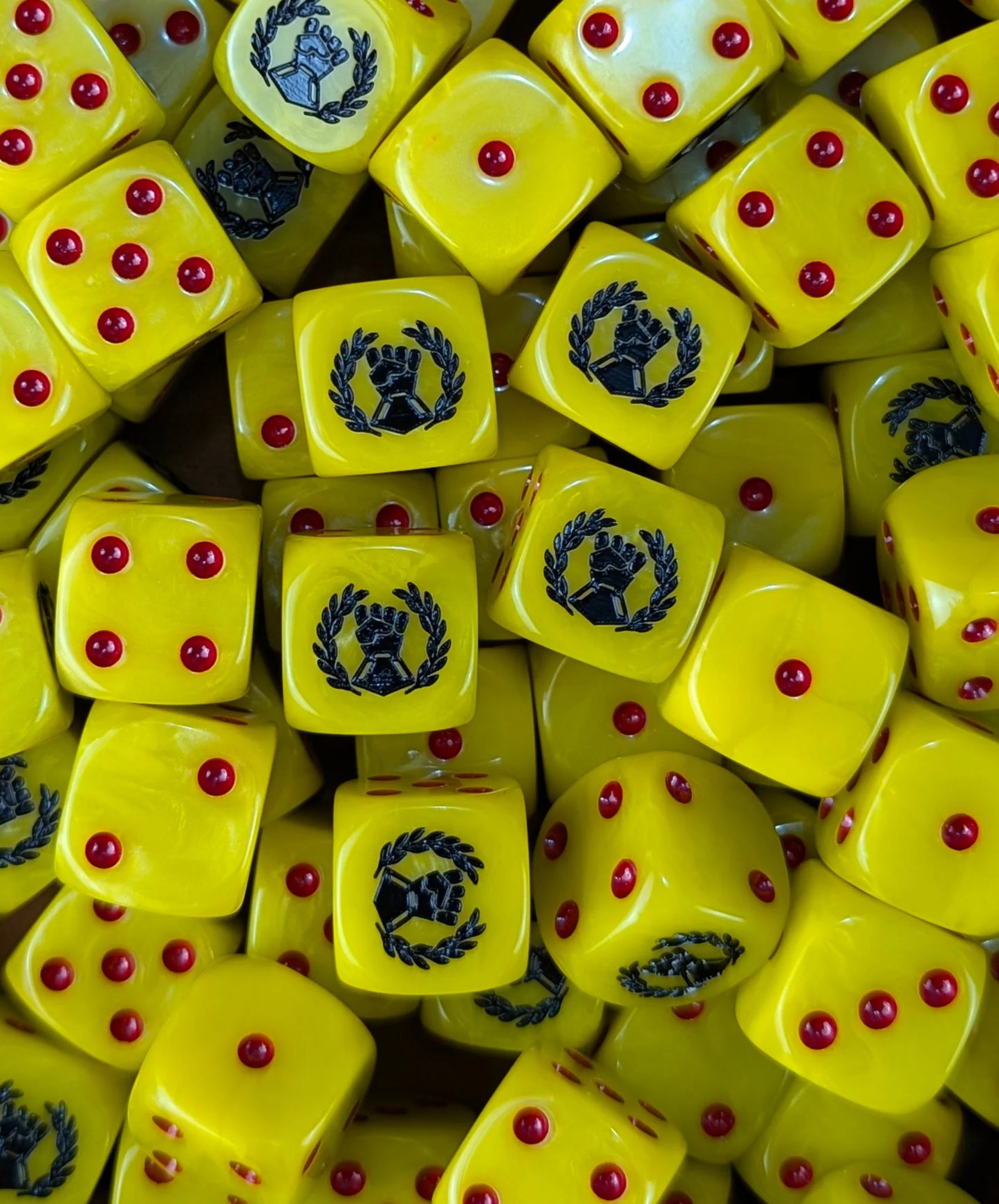Pile of yellow fist 16mm D6 dice for a sci-fi siege army