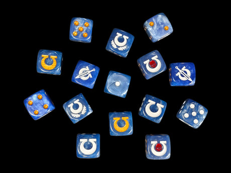 Fifteen blue 16mm resin D6 scattered on black, some showing pips and some an engraved emblem