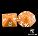 Close up of a brown D8 and D16 with white numbers for scatter and long range fantasy football rolls