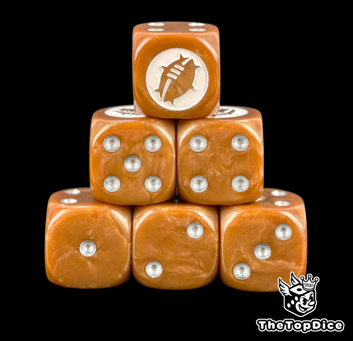 Close up of two brown D6 with silver pips and a white ball crest on the six face for fantasy football
