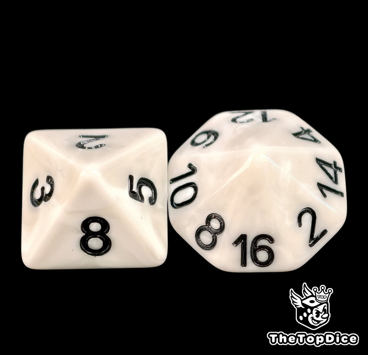 Close up of a white D8 and D16 with black numbers for scatter and long range rolls