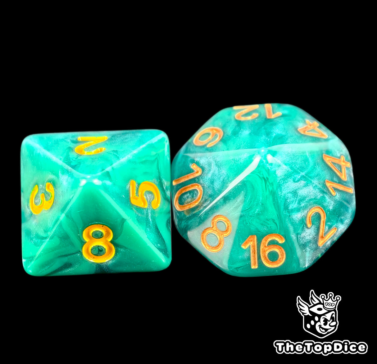 Close up of a turquoise D8 and D16 with gold numbers for scatter and long range rolls