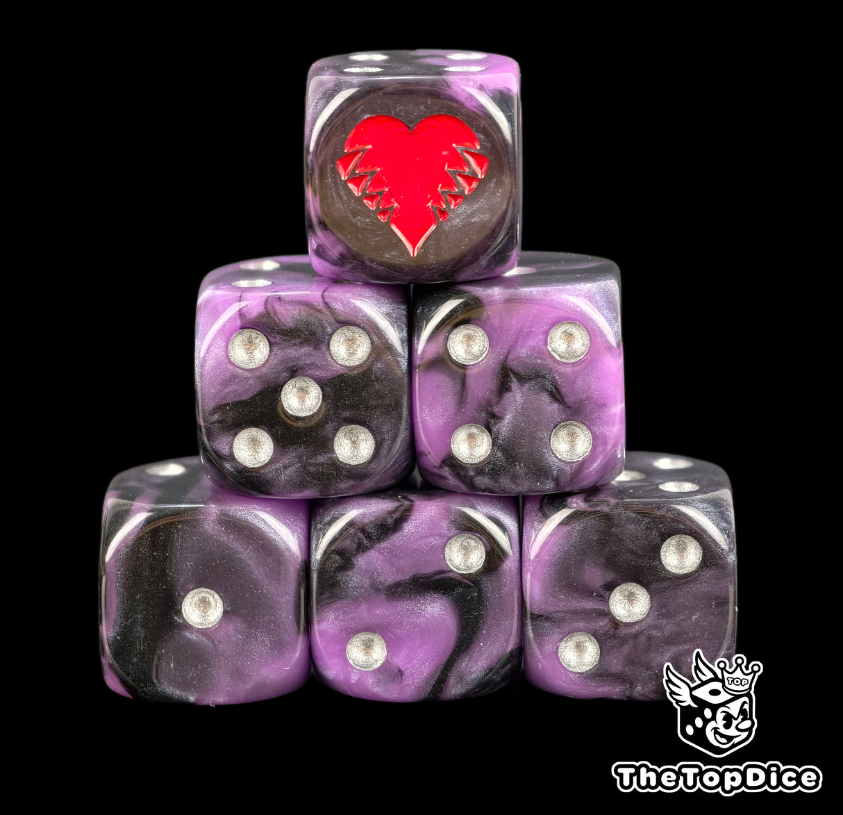 Two purple and black 16mm D6 with silver pips and a red clawed heart crest on the six for Blood Bowl