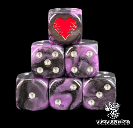 Two purple and black 16mm D6 with silver pips and a red clawed heart crest on the six for Blood Bowl