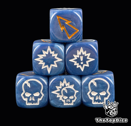 Three blue 16mm block dice with white skull and burst symbols and a gold arrow for Blood Bowl