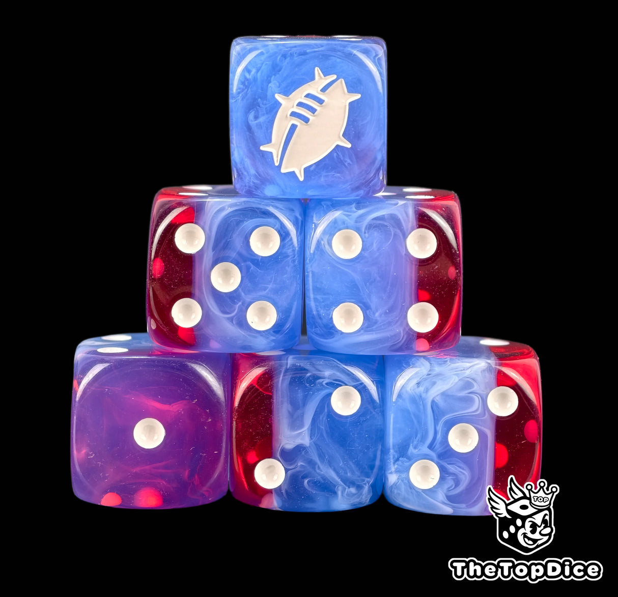 Two translucent red and blue 16mm D6 with white pips and a white spiked ball crest on the six